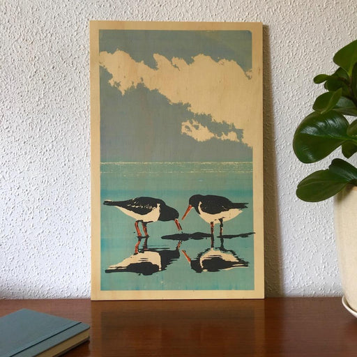 Photo of a shorebird, the Australian Pied Oystercatcher screenprinted on plywood. 