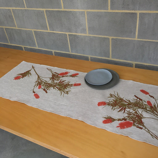 Photo of a Bottlebrush screenprinted on a table runner.