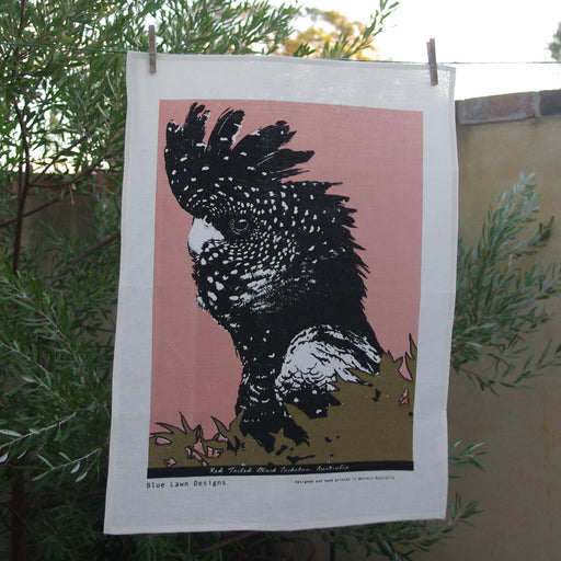 Photo of a Red-tailed Black Cockatoo screenprinted on a tea towel.