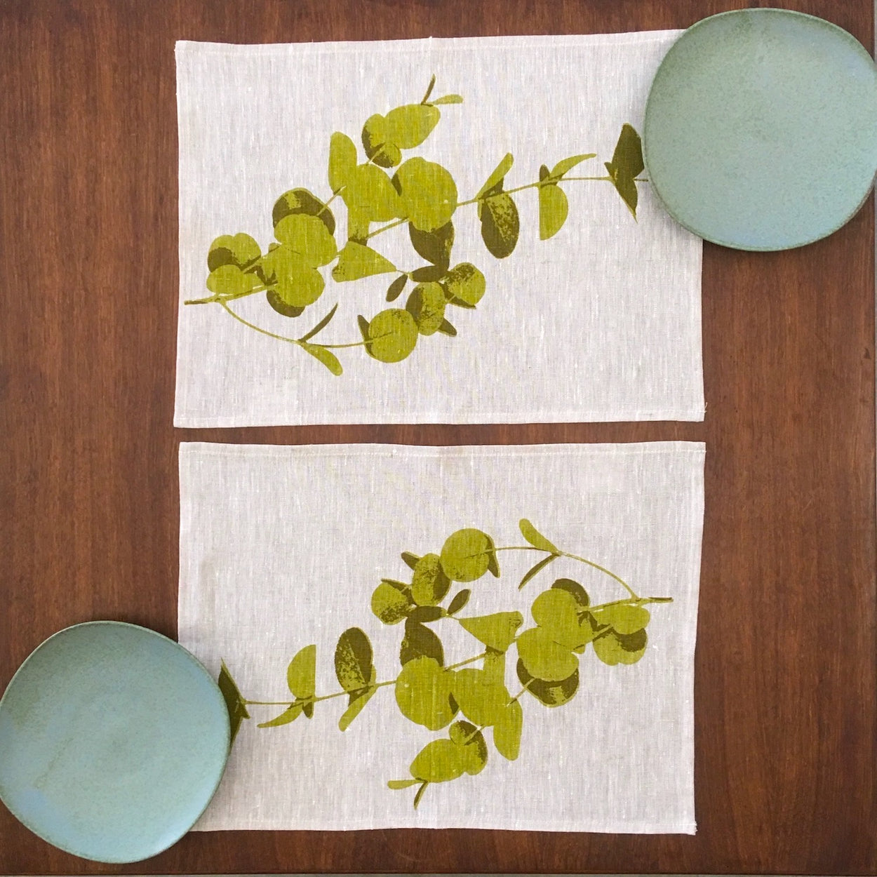 Photograph of eucalyptus leaves screenprinted on placemats.