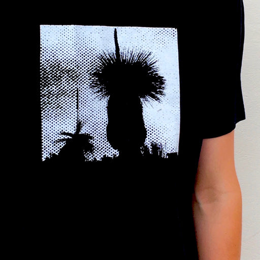 Photograph of screenprinted t-shirt depicting a Western Australian grass tree.
