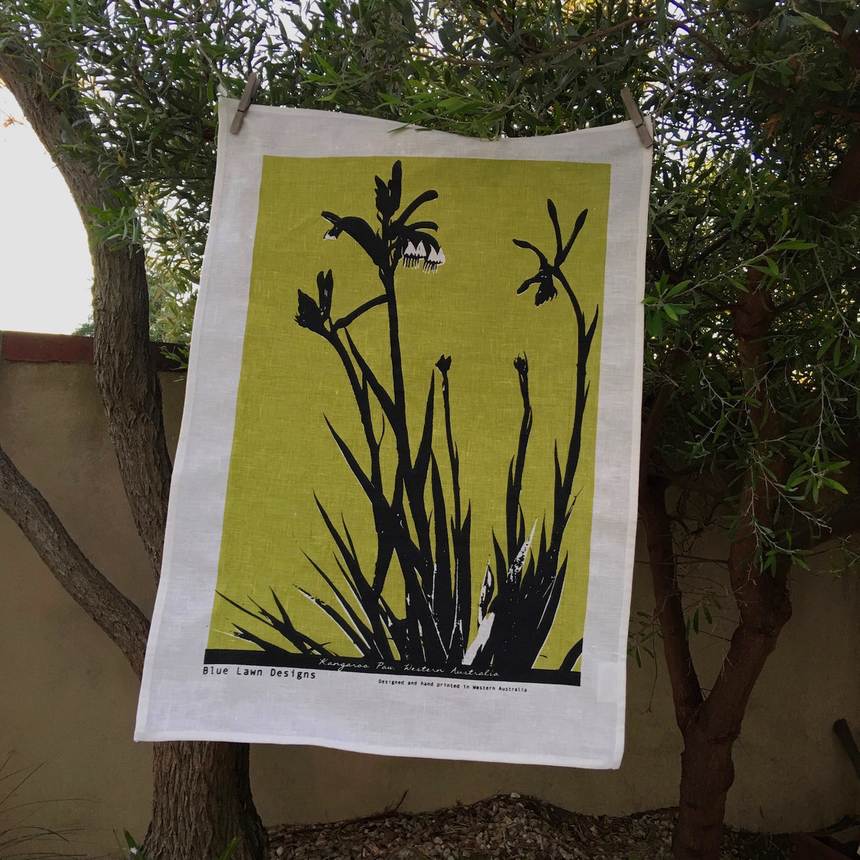 Photograph of a Western Australian kangaroo paw plant screenprinted on a tea towel.
