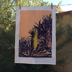 Photo of a Candle Banksia screenprinted on a tea towel.
