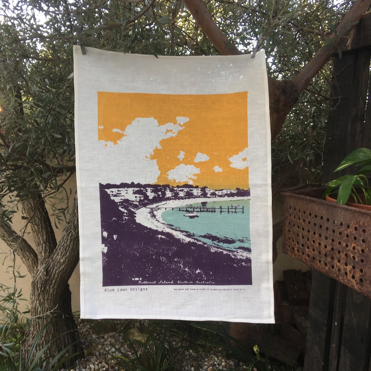 Photo of Geordie Bay, Rottnest Island screenprinted on a tea towel.