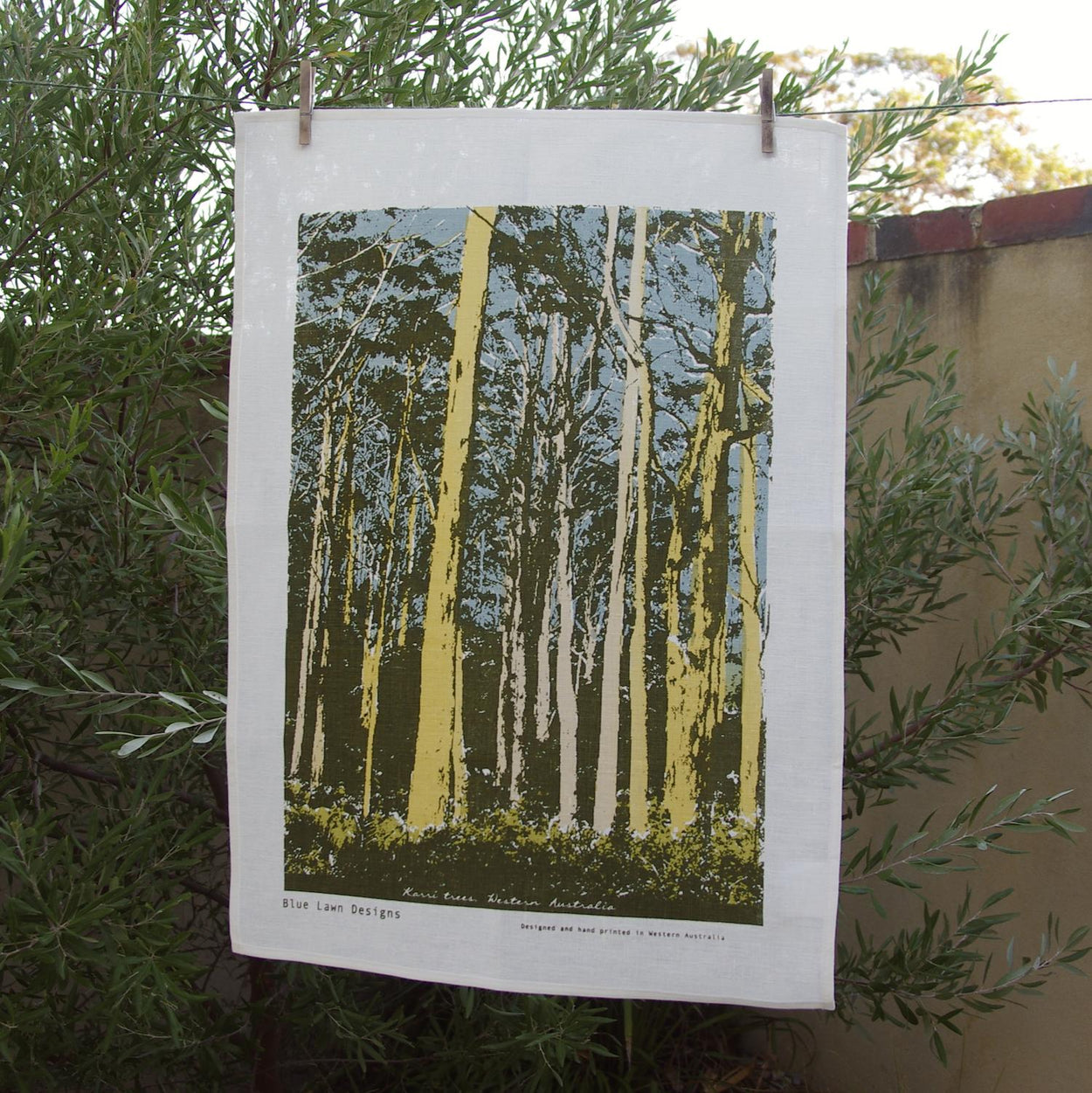 Photograph of Western Australian karri trees screenprinted on a tea towel.