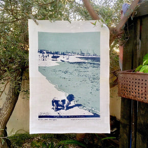 Photo from Leighton dog beach screenprinted on a tea towel.