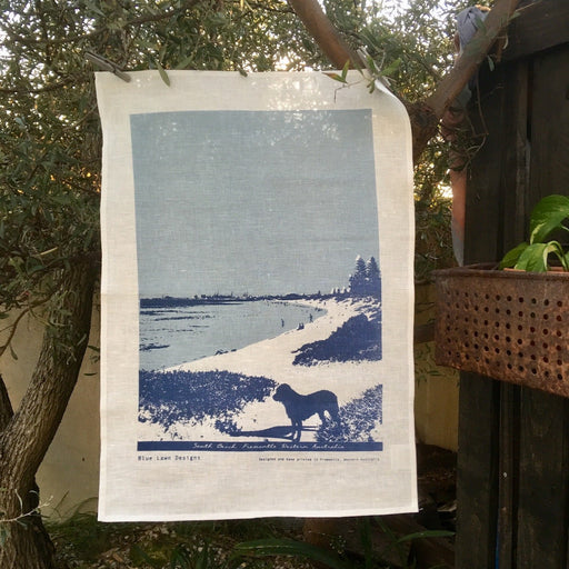 Photo of a dog at South Beach, Fremantle screenprinted on a tea towel.