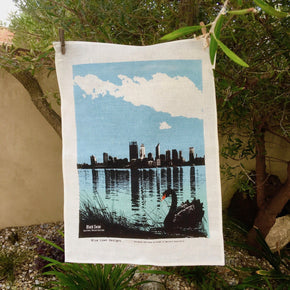 Photo of a black swan on the Swan River at South Perth screenprinted on a tea towel.